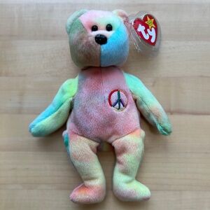 Rare 1996 Peace Beanie Baby. Mint condition with tag in hard plastic cover.
